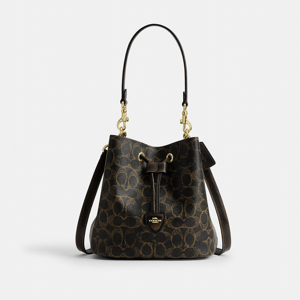 Coach Outlet Rowan Bucket Bag In Loved Signature Canvas With Charms